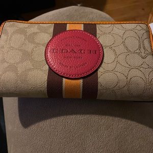 Red leather patch Dempsey coach wallet